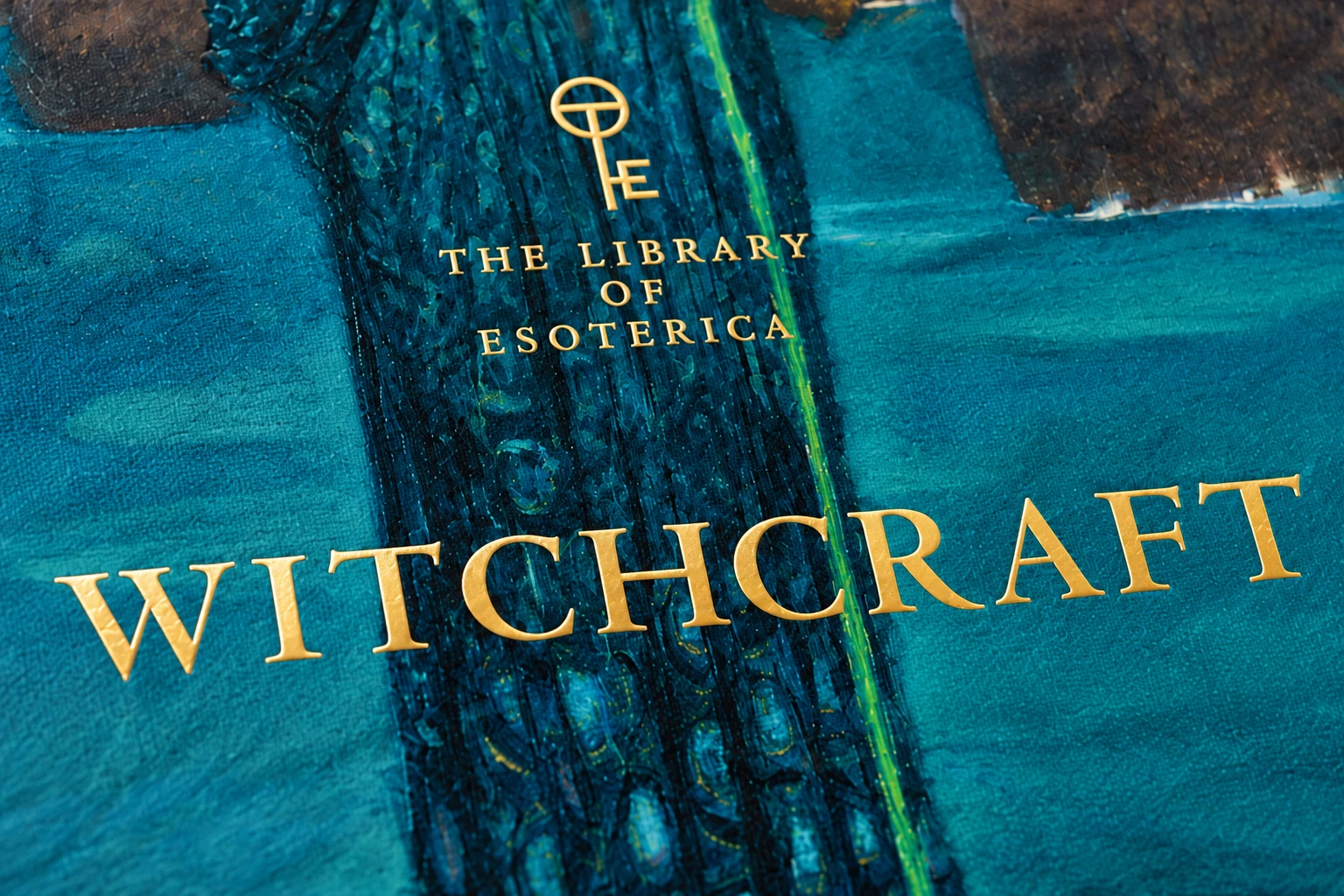Gold Witchcraft title and Library of Esoterica lettering on a teal book-cover detail, recreated with AI.